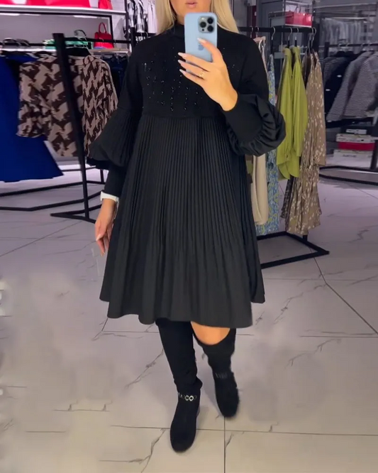 Fekete magas nyakú ruha lámpás ujjakkal