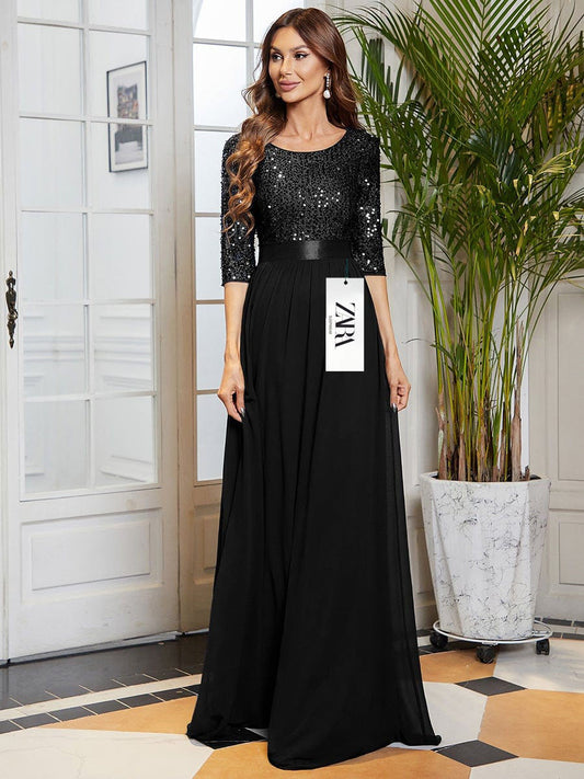 Elegáns, flitteres ruha hosszú ujjal és kerek nyakkivágással