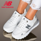 New Balance női retró stílusú hétköznapi cipő.