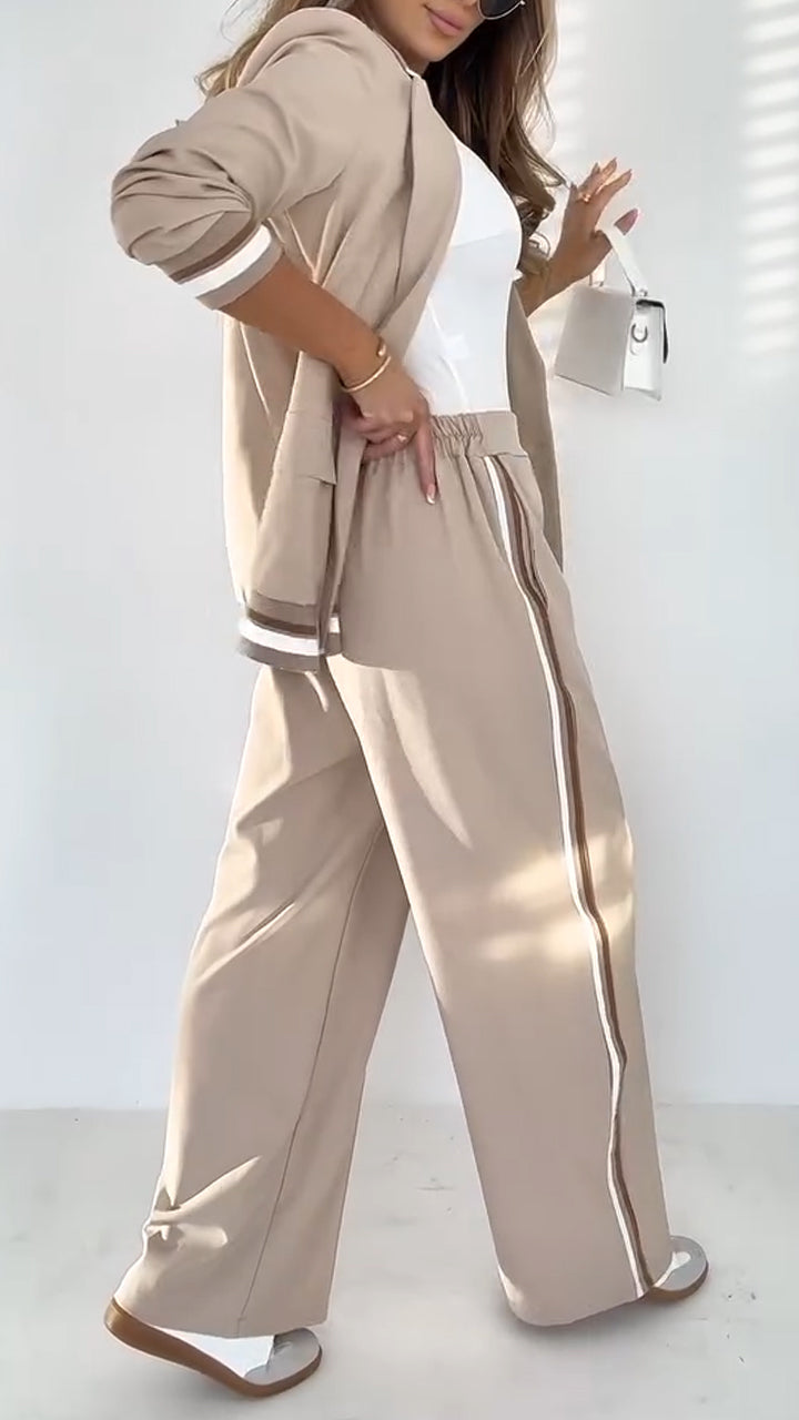 Női hajtóka egyszínű, csíkos alkalmi öltöny