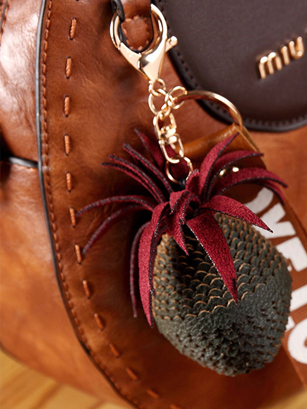 Kerek formájú vintage bőrtáskák, bojtokkal. Válltáska