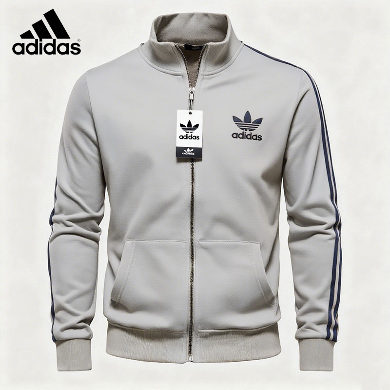 Klasszikus Adidas pulóver állógallérral és cipzárral, a retró stílus és a divat ötvözete.