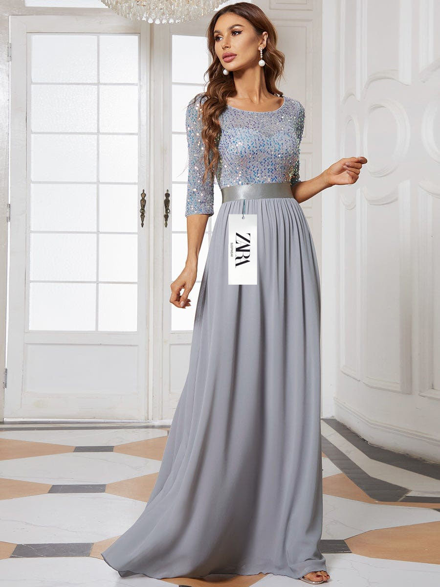 Elegáns, flitteres ruha hosszú ujjal és kerek nyakkivágással