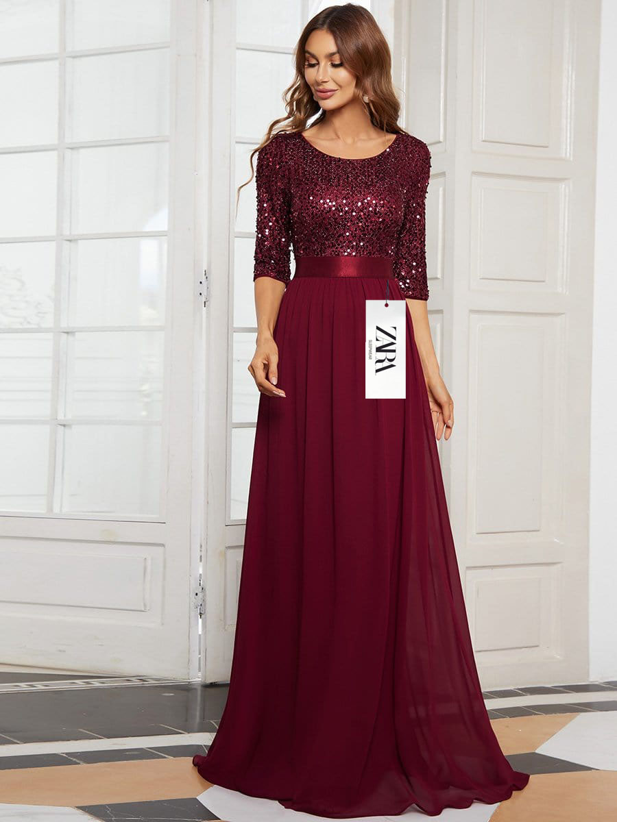 Elegáns, flitteres ruha hosszú ujjal és kerek nyakkivágással